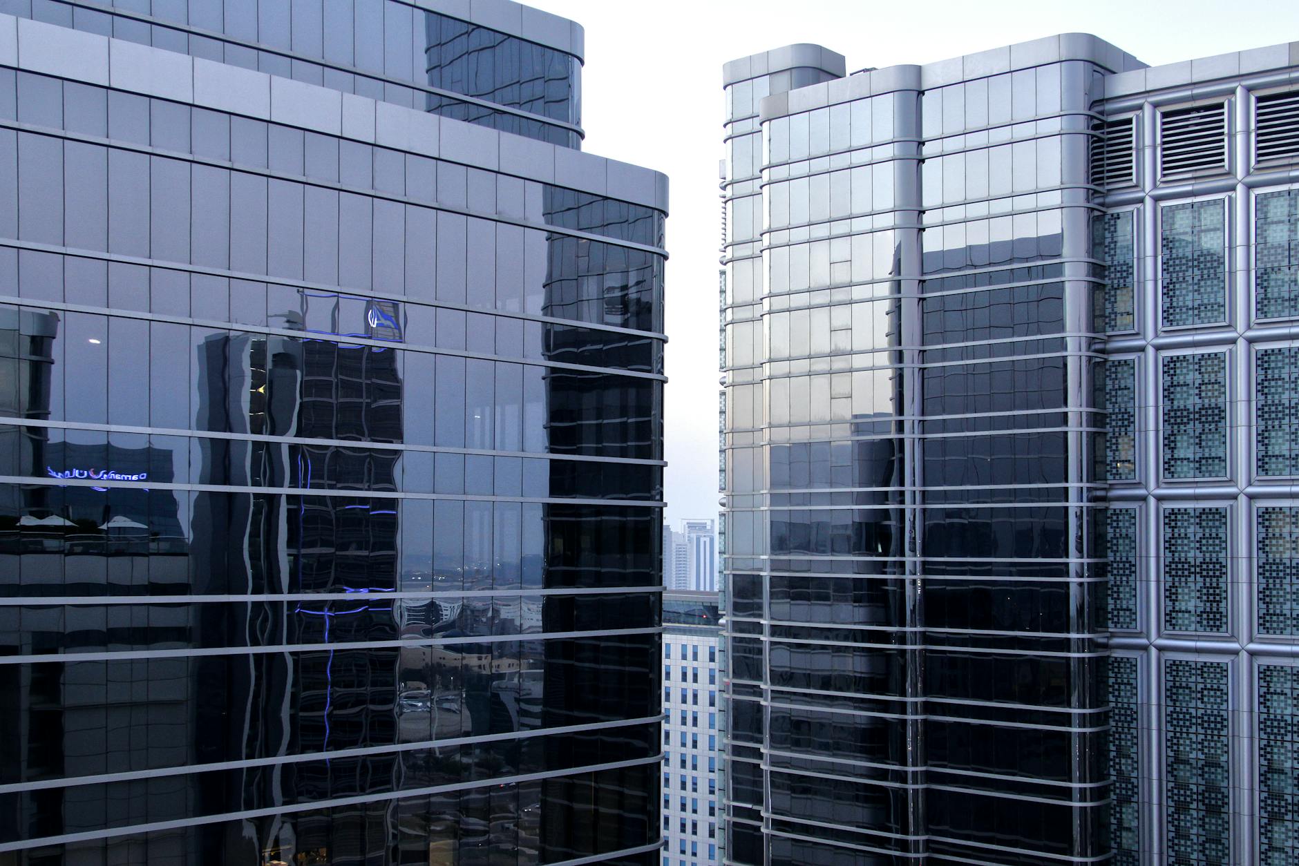 Modern office tower glass facade in Abu Dhabi