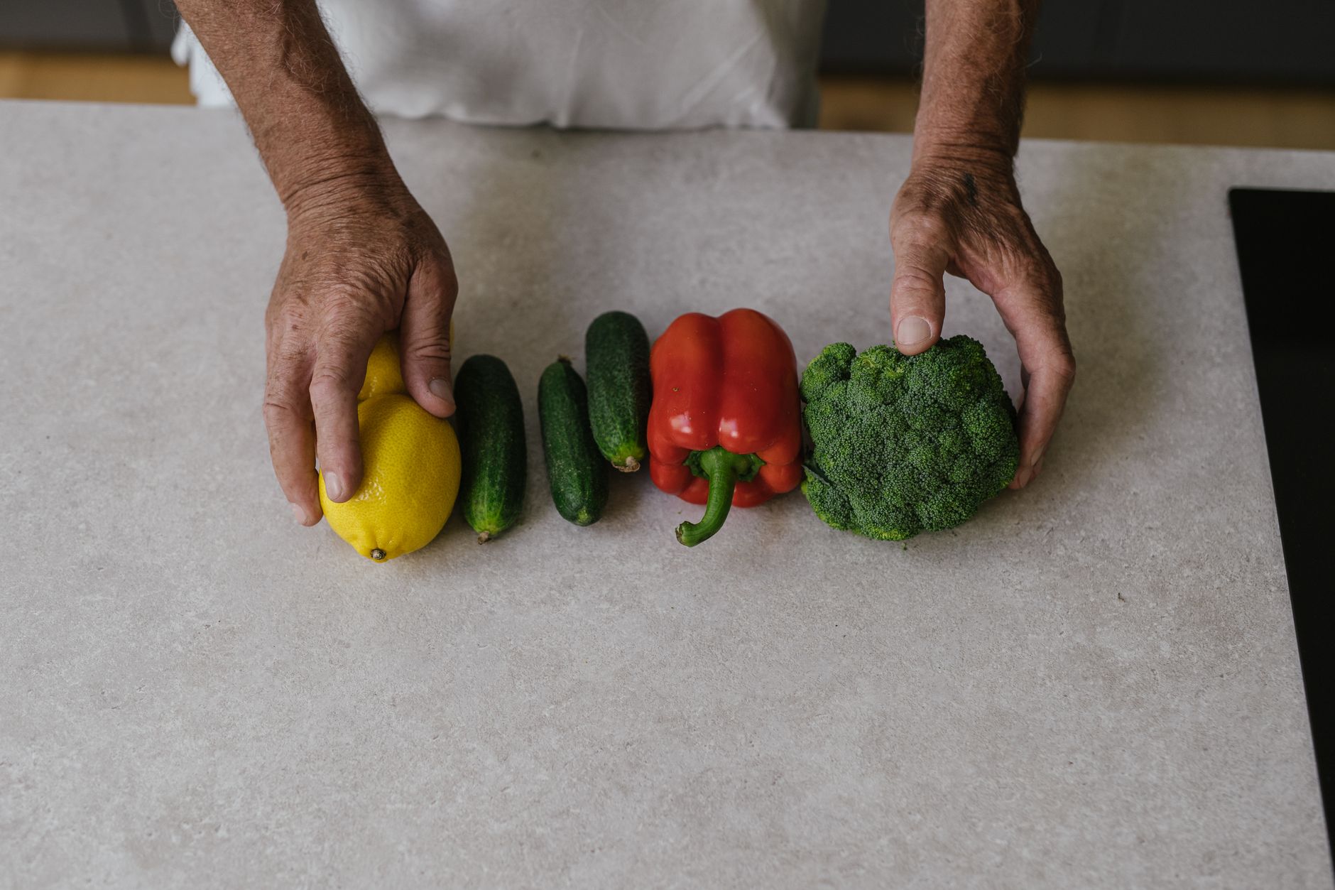 Fresh vegetables on a bright kitchen counter