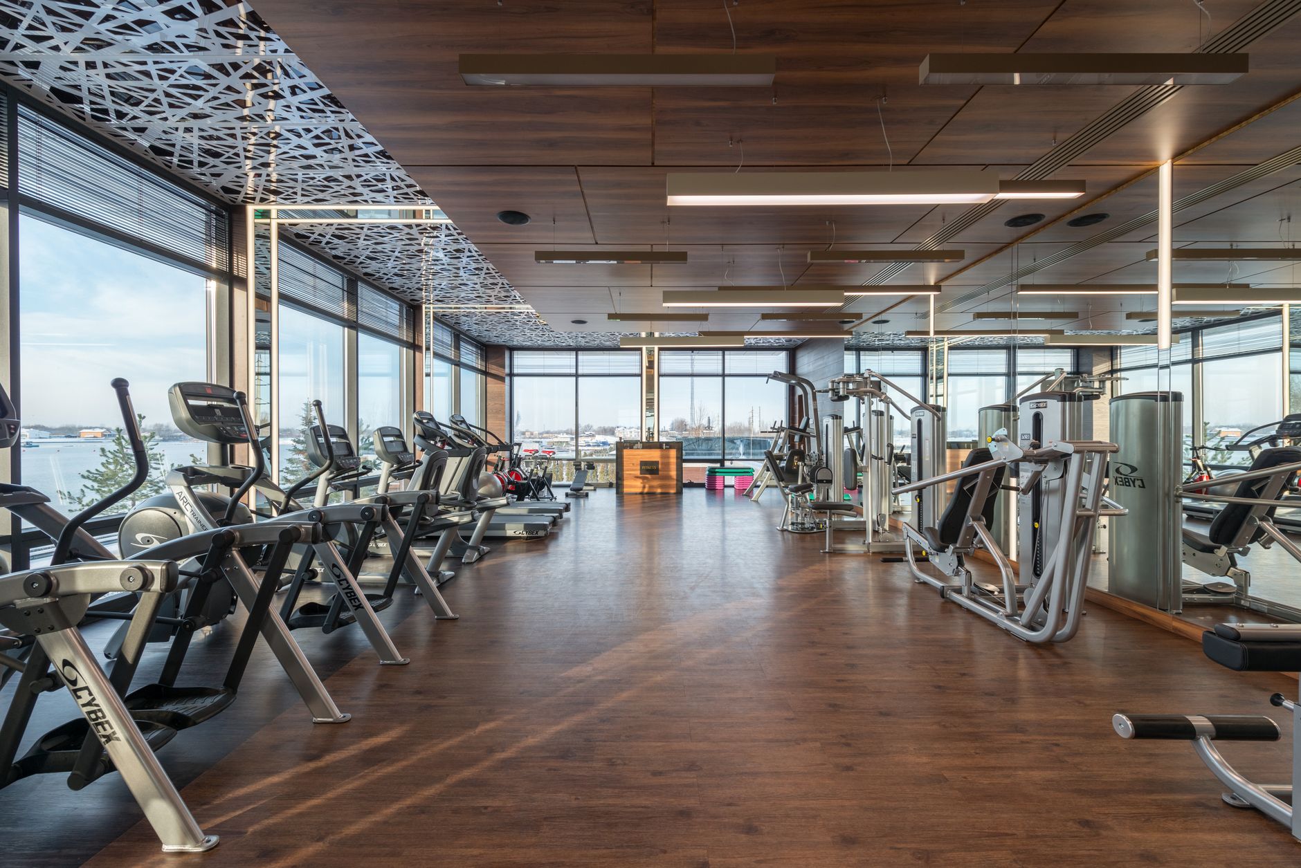 Equipment in a modern gym interior in daylight