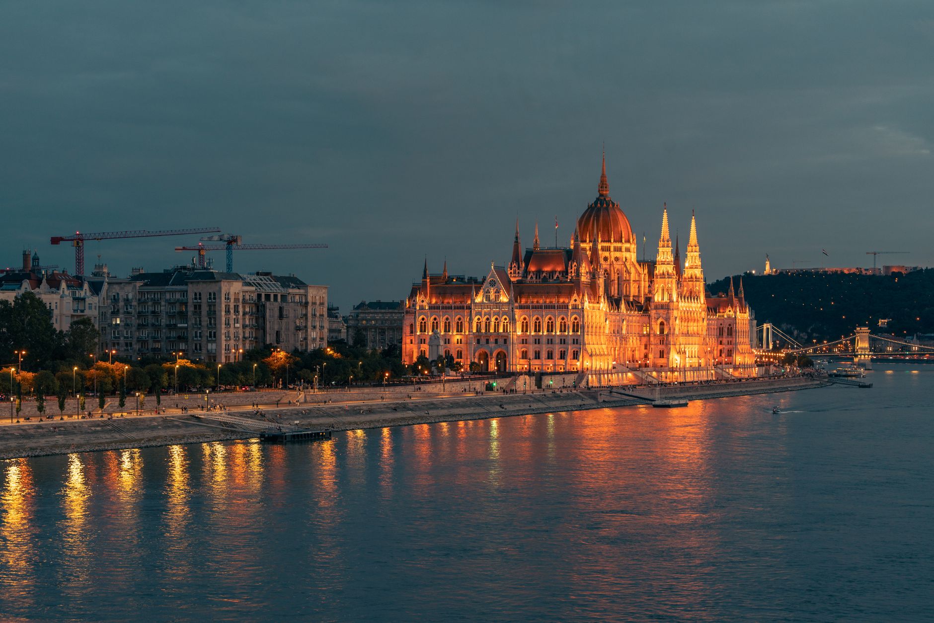 The Danube at dusk in Budapest, with the Parliament building lit on the far bank