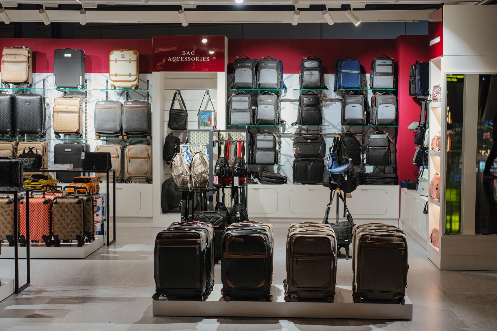 Suitcases and backpacks on display in a luggage shop