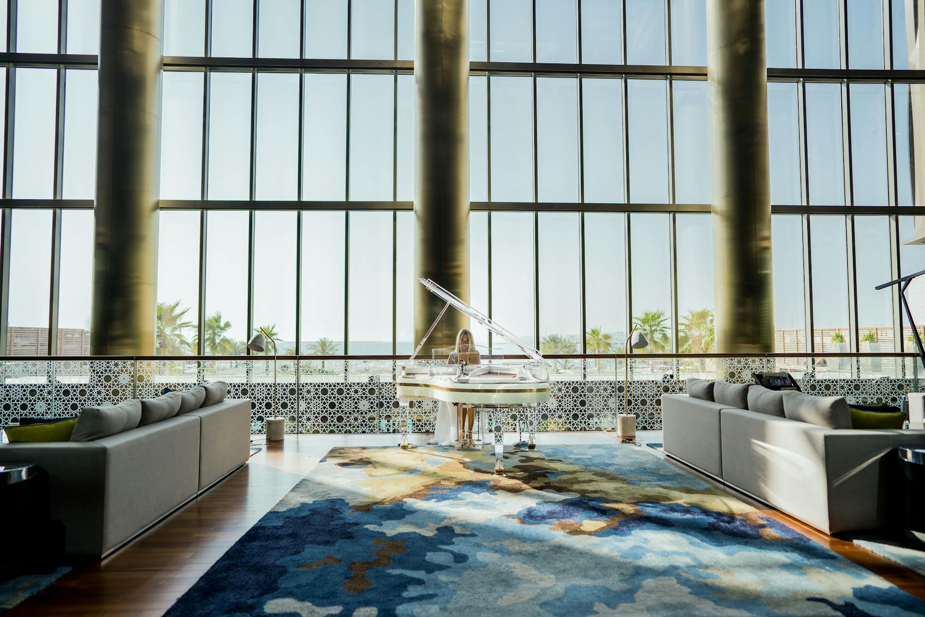 Luxury hotel lobby with marble and warm lighting